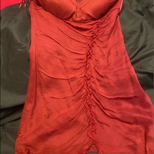 Deep red silk dress.